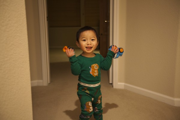 2011.1.2 - Happy with a toy in each hand